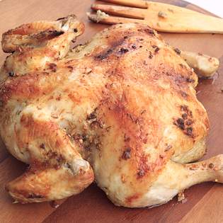 Previsualización de la receta Pollo entero asado con relleno de hierbas frescas