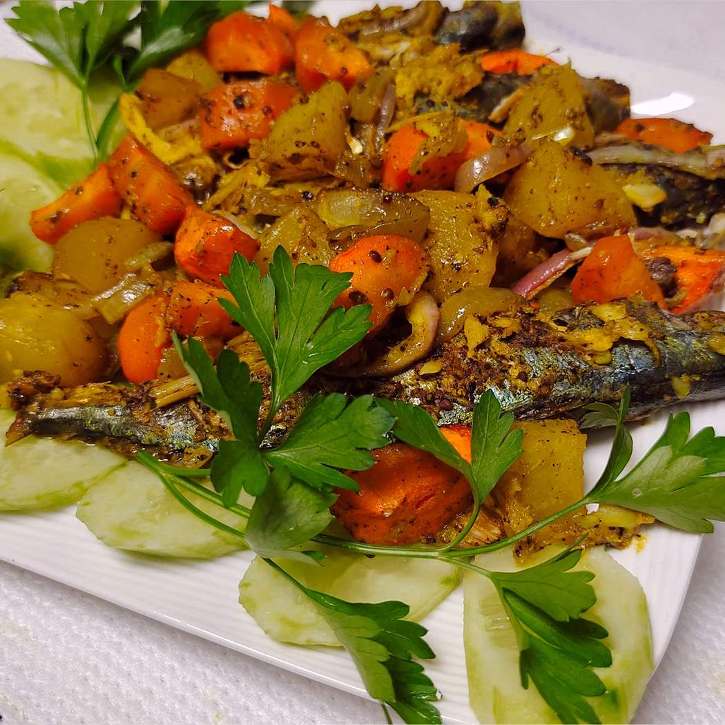 Baked mackerel with cherry tomatoes and potatoes