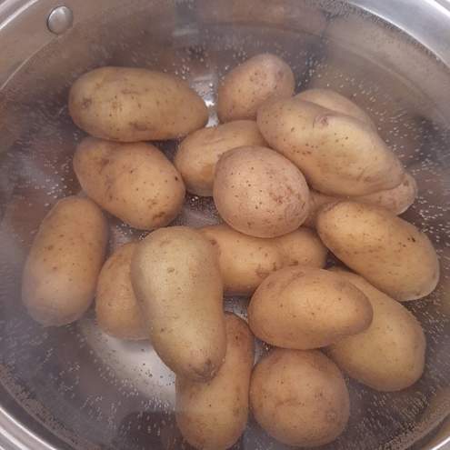 Cosce di pollo al forno con patate schiacciate - procedimento 1