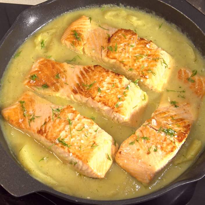 Juicy cooked salmon in sauce with potatoes recipe